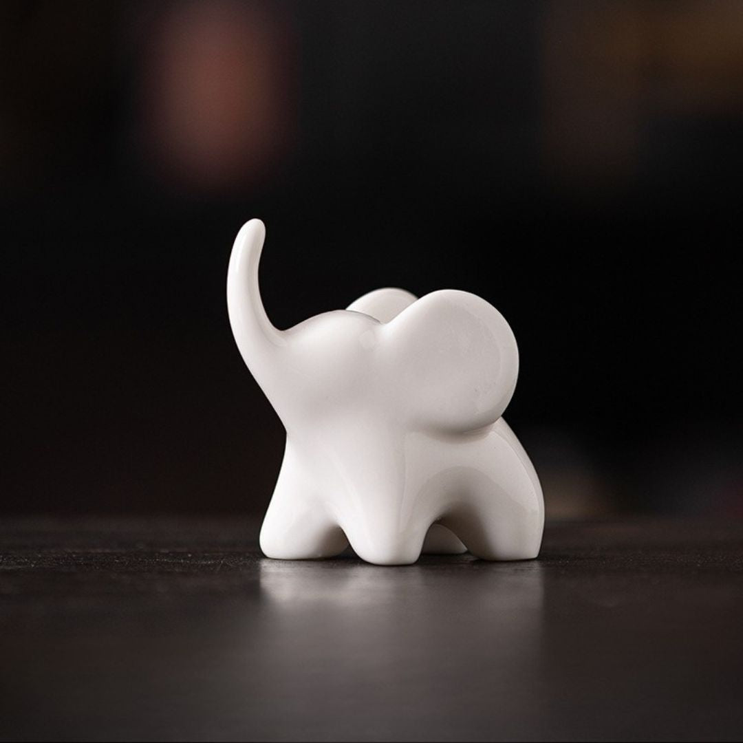 Ceramic Upturned Trunk Elephant Figurine -White