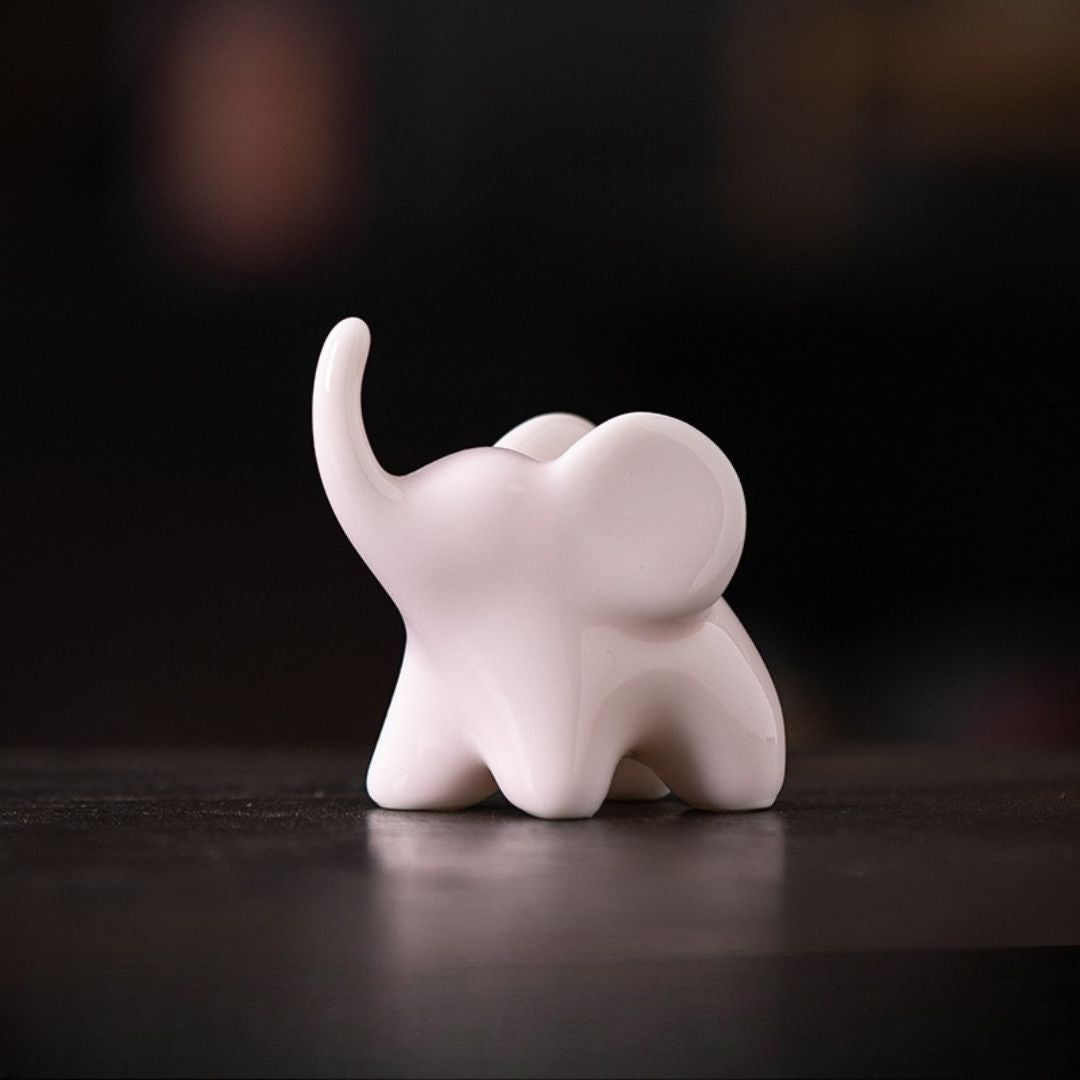 Ceramic Upturned Trunk Elephant Figurine - Pink