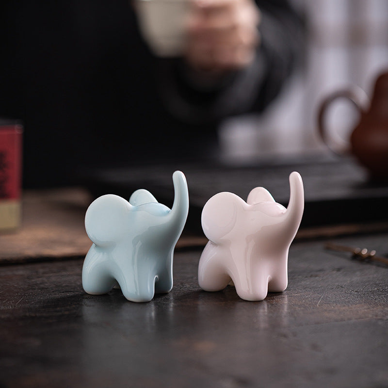 Ceramic Upturned Trunk Elephant Figurine -White